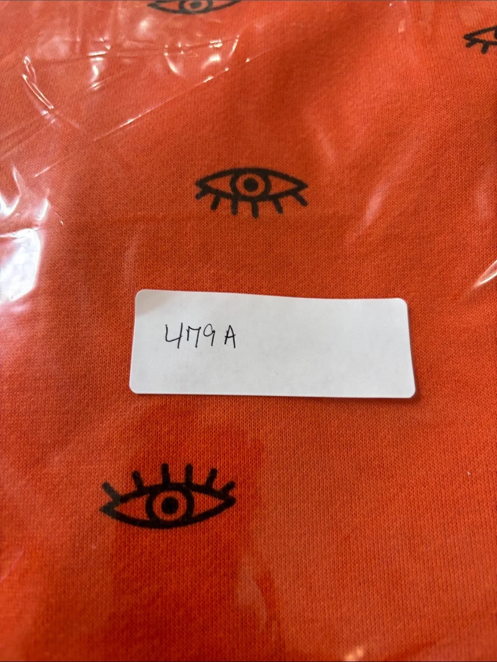 Adika Women’s Bright Orange Eye-Print Crewneck Hoodie and Pants set